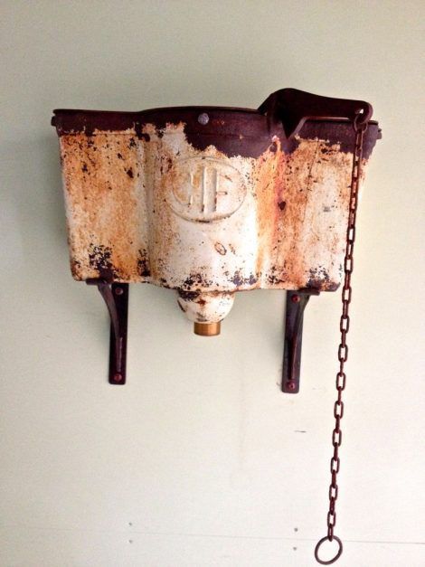 antique cast iron cistern