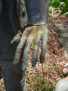 Hand detail of lead garden statue.